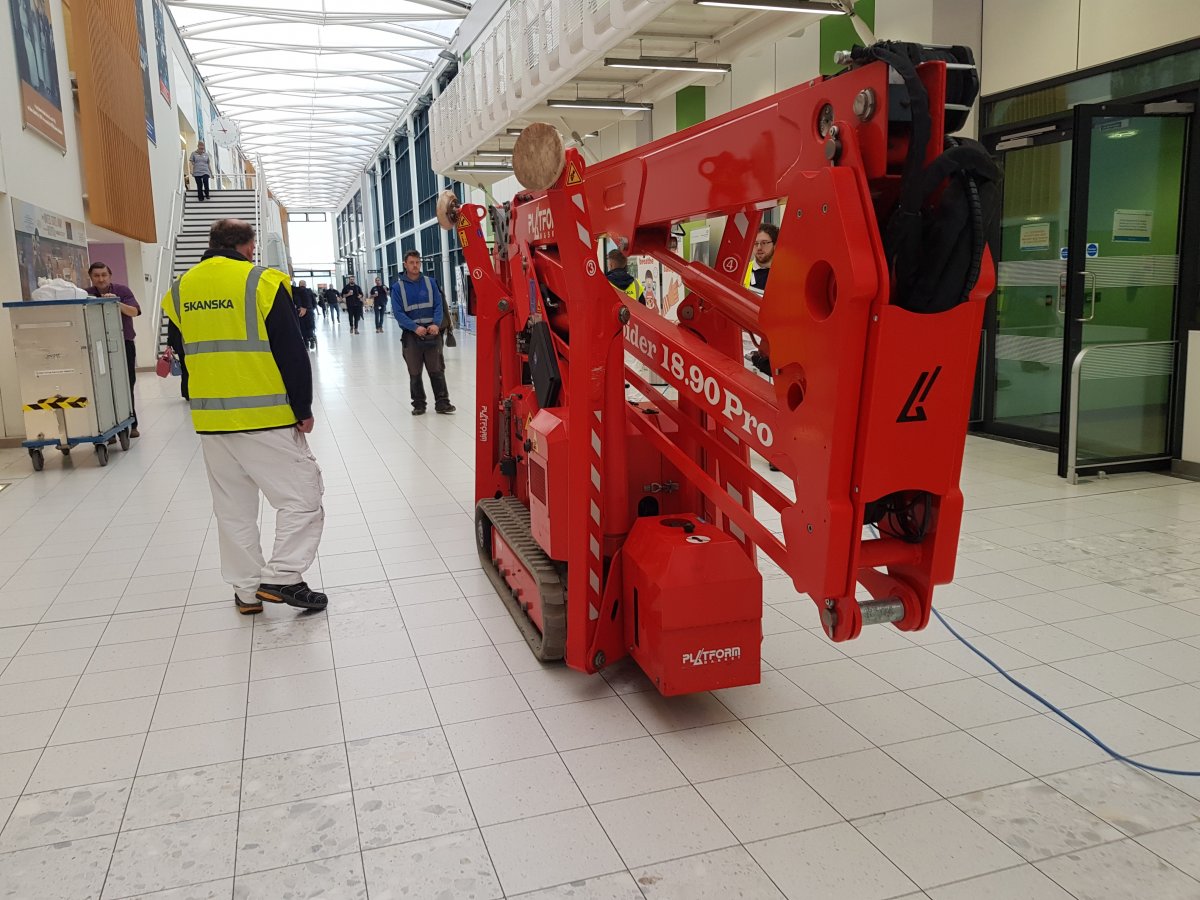 photo shows the platform 1890 pro tracked spider cherrypicker, tracking through kingsmill hospital using its electric motors