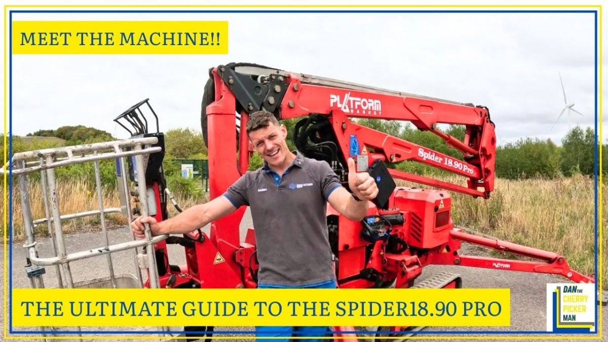 Photo show a red platform basket 1890 pro  tracked spider cherrypickerset up with the out riggers down ready doe work