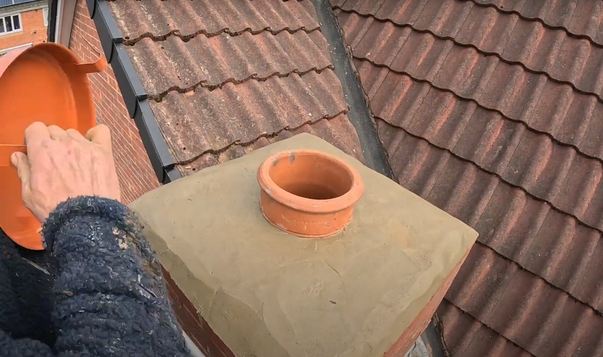 Picture of reduced chimney with new concrete flauncing and a chimney cowl about to be installed, in Forest Town, Mansfield, Nottinghamshire