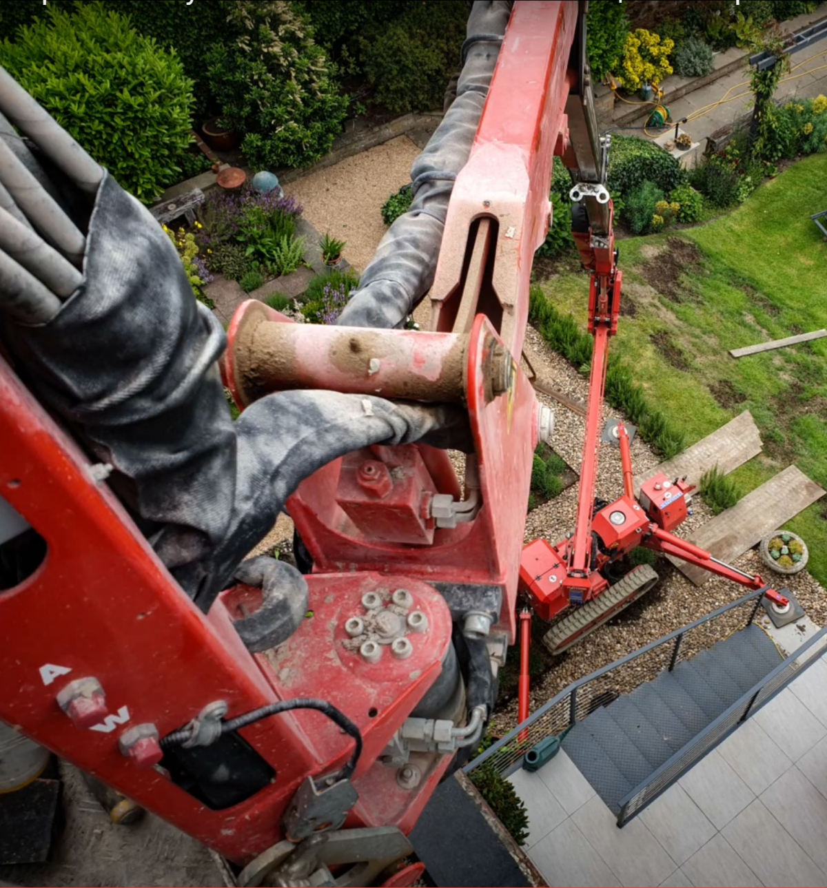 Looking down the boom of a tracked spider cherrypicker in the Park, Nottingham